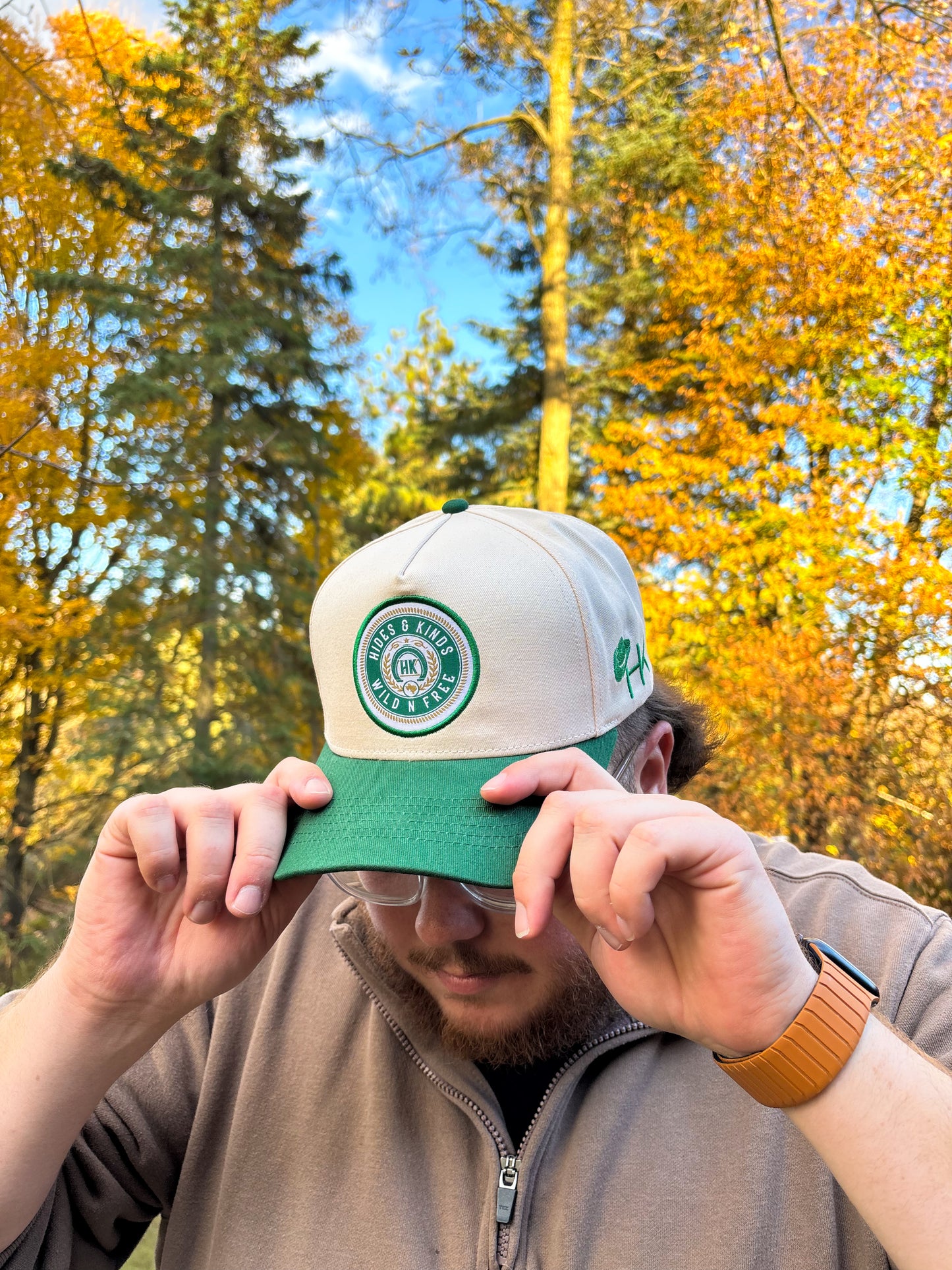 Angled front view of The Country Line Hat by Hides & Kinds, inspired by classic beer-label design.