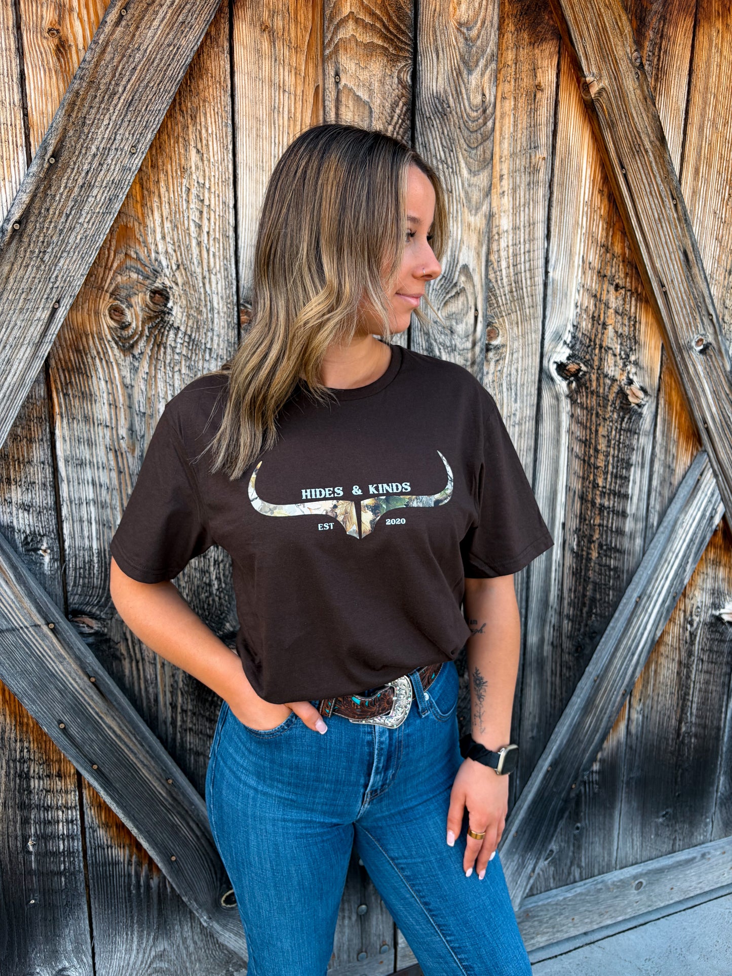 Close up of camo longhorn logo on brown Hides and Kinds western t-shirt