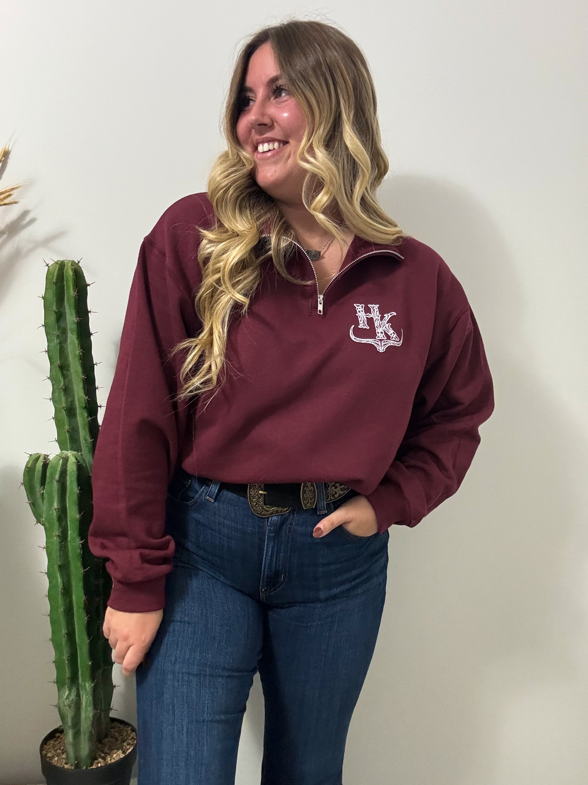 Full outfit featuring the HK Brand Quarter Zip in maroon, styled casually with jeans and a western belt.