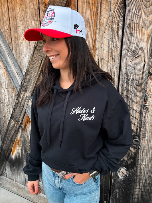 Front view of the Signature Western Hoodie in black with the clean HK chest logo.