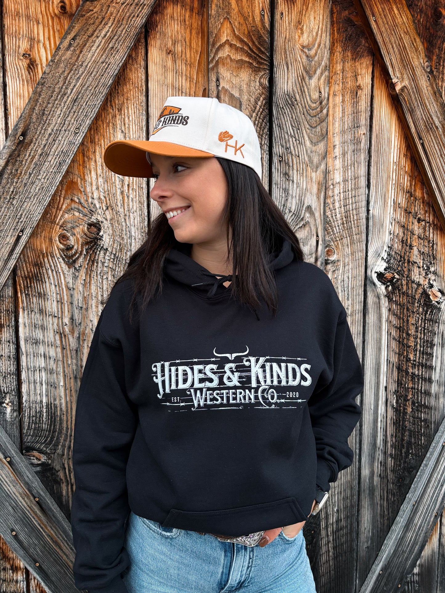 Front view of the Stockyard Hoodie in black featuring the bold HK Western Co. barbed wire graphic.