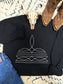 Black crewneck with detailed boot stitch graphic, styled for a bold western look