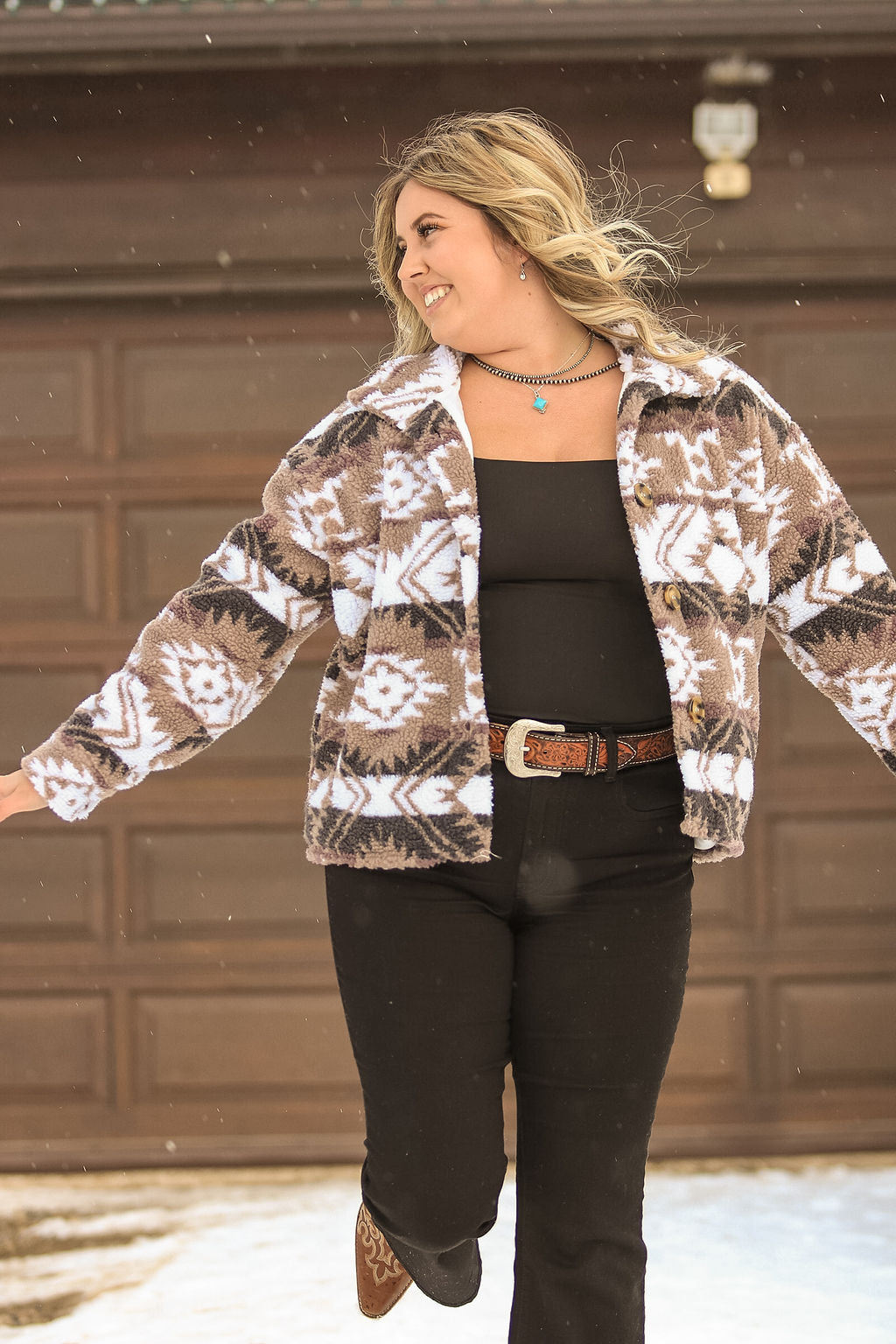 Close-up of button front and soft sherpa fabric on Aztec Sherpa Jacket