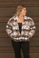 Front view of Aztec Sherpa Jacket with brown and white Aztec print