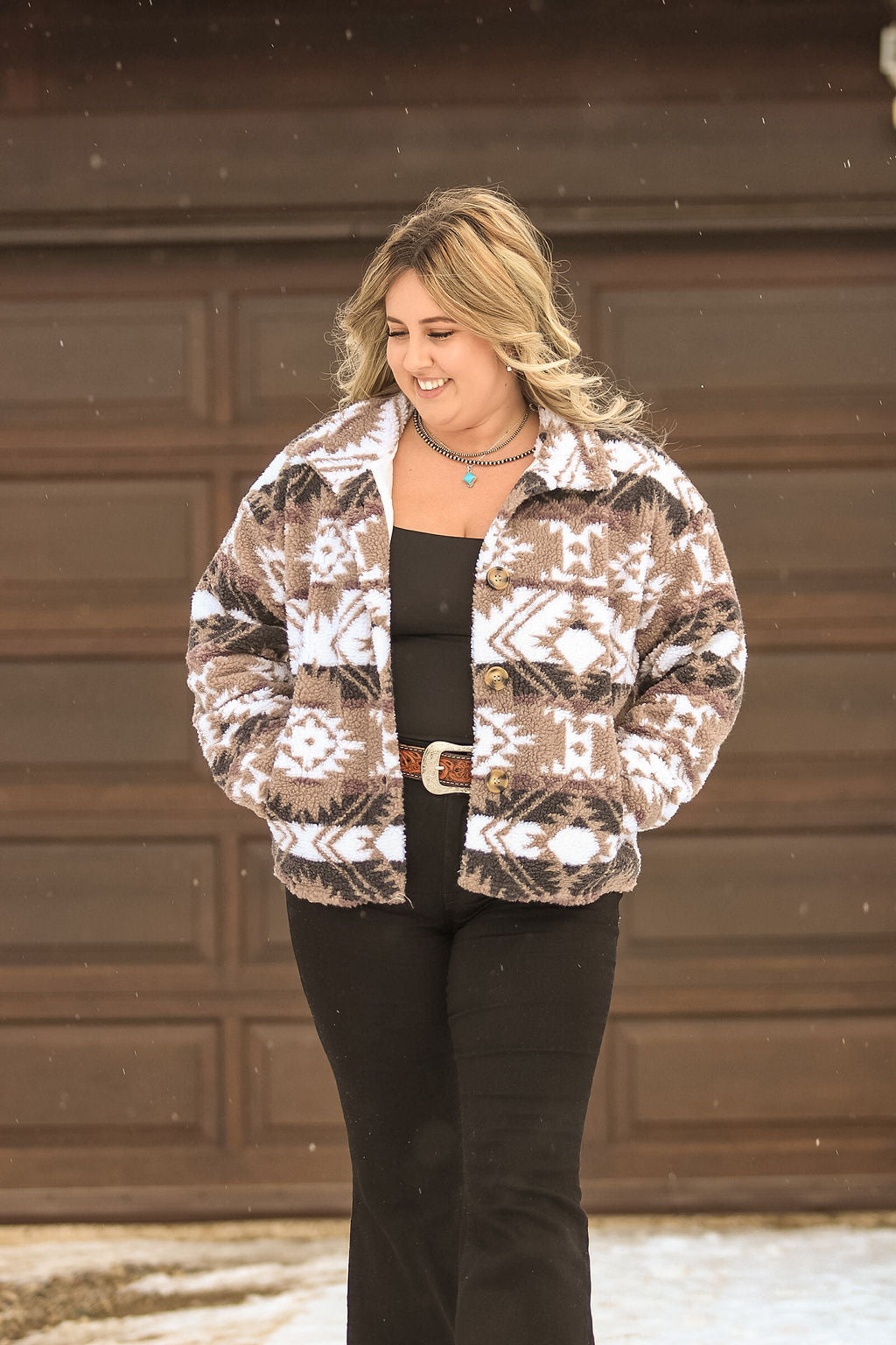 Lifestyle photo of Aztec Sherpa Jacket styled with jeans