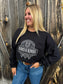 Close up of the Brand Outback Crewneck front design, black-on-black print