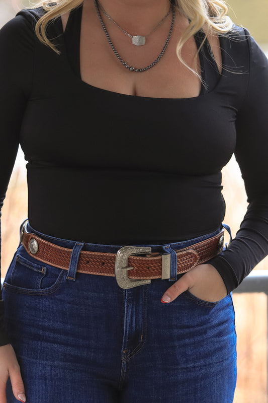 Front view of Saddle Ridge brown leather belt with silver buckle