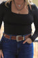 Front view of Saddle Ridge brown leather belt with silver buckle
