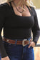Side view of Saddle Ridge brown western leather belt with engraved buckle