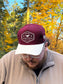 Front view of maroon and natural Hides & Kinds Wild N Free Hat with western patch logo.