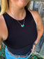 Model wearing the Stillwater Bar Necklace styled with black tank and jeans