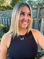 Model wearing the Turquoise Wildstone Necklace styled with a black tank top and natural lighting.