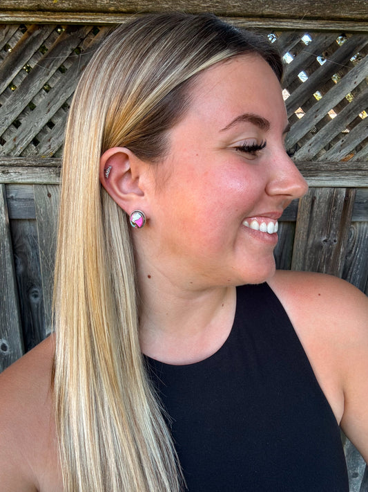 Woman smiling in a black tank top showcasing the Candy Quartz Studs from a side profile, styled with long blonde hair.