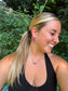 Cotton Candy Cluster Stud Earrings styled outdoors with greenery background