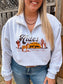 Model styled in the grey Desert Horse Quarter Zip by Hides and Kinds, featuring a desert scene with horses and cacti across the front.