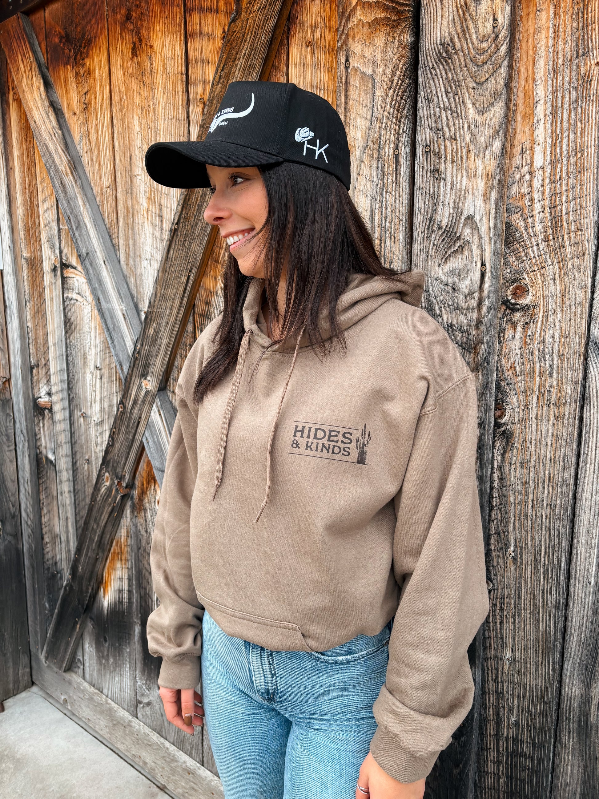 Front view of the Desert Ridge Hoodie in Teddy Brown with the HK logo and cactus graphic.