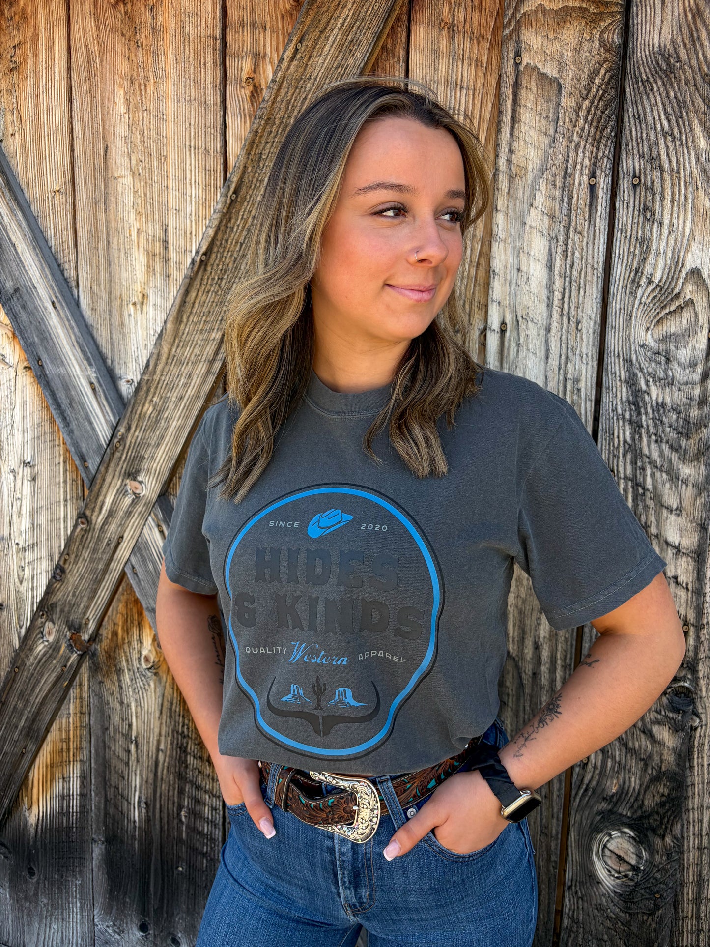 Front view of Dustland Tee with vintage western style graphic print