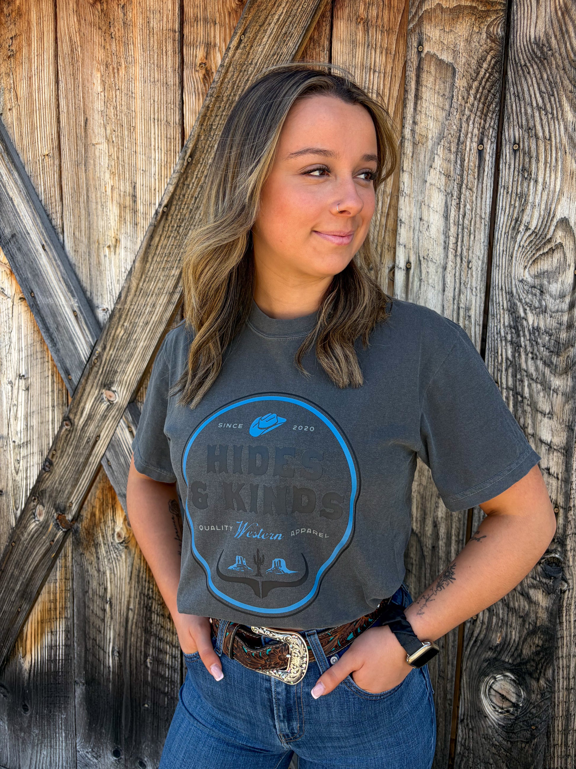 Front view of Dustland Tee with vintage western style graphic print