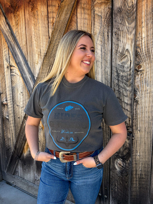 Charcoal western graphic t-shirt with Hides & Kinds logo badge design