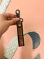 Frontier Tooled Wristlet with turquoise floral tooling and antique brass clasp – Hides & Kinds