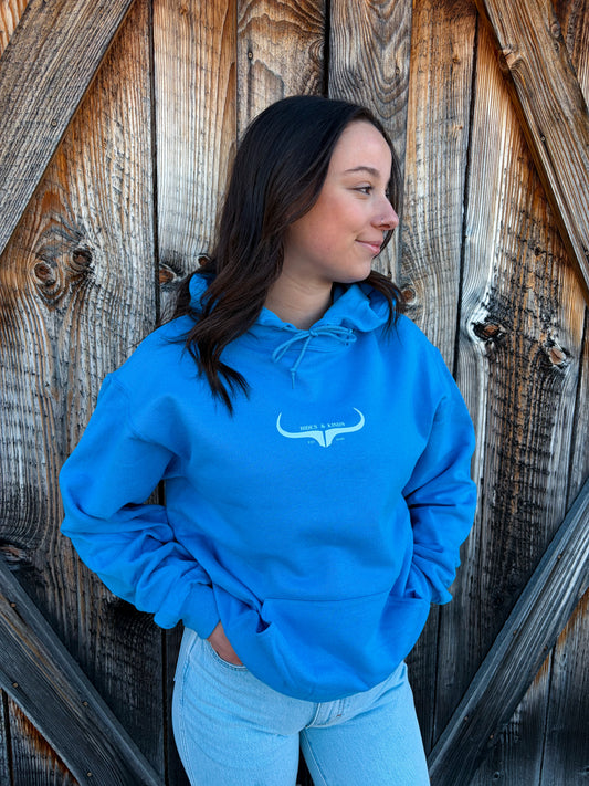 Country outfit featuring blue hoodie and denim jeans, western lifestyle apparel