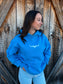 Country outfit featuring blue hoodie and denim jeans, western lifestyle apparel
