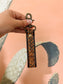 Western leather wristlet keychain in brown and turquoise floral design – Hides & Kinds