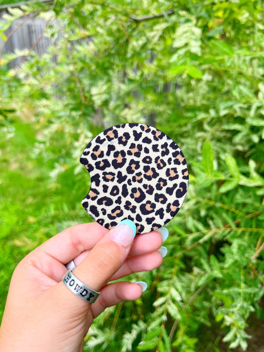 Western leopard print car coaster on greenery background – Hides & Kinds