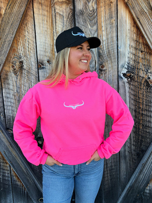 Neon pink western hoodie with longhorn logo by Hides and Kinds
