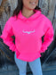 Bright pink country hoodie styled with denim and black hat