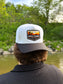 Back view of Hides & Kinds Southwest Snapback with white crown, black brim and western desert patch