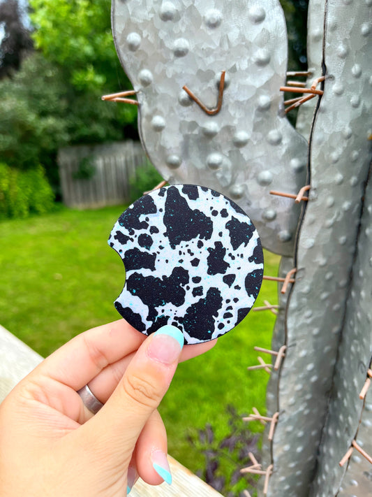 Western black and white cowhide print car coasters with turquoise accents – Hides & Kinds