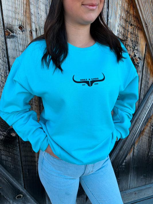 Teal western crewneck sweatshirt with longhorn logo by Hides and Kinds