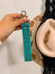 Western turquoise leather wristlet keychain with floral tooling – Hides & Kinds