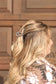 Close-up of pearl and turquoise beaded claw clip from Hides & Kinds
