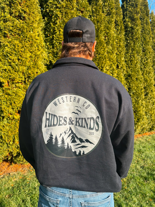 Back view of black High Country quarter zip featuring large Hides & Kinds mountain graphic
