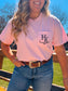 Close up of the HK Branded Pocket Tee in Blossom Pink featuring the original western style HK logo printed on the front pocket.