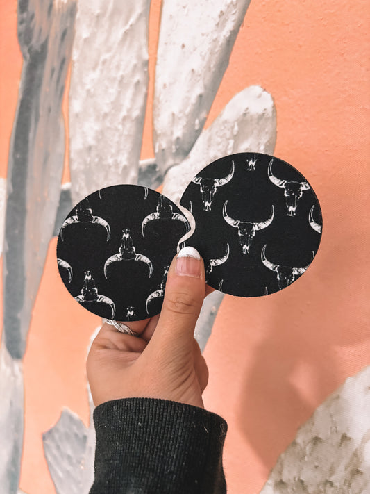 Set of Longhorn Car Coasters with black background and white longhorn design – Hides & Kinds