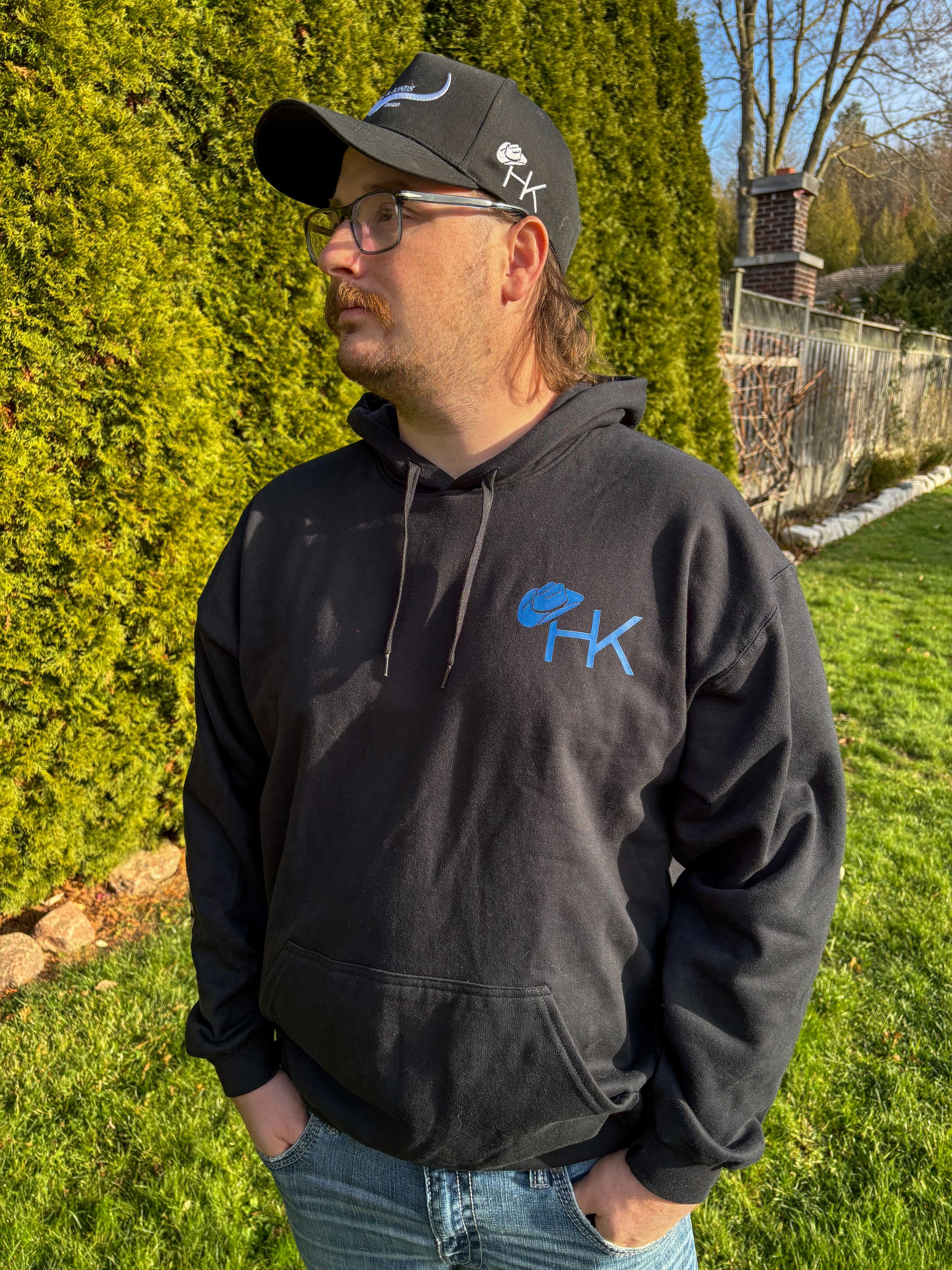 Men’s black Midnight Longhorn hoodie with blue HK chest logo by Hides & Kinds