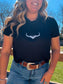 Western outfit featuring the black cropped tee with Hides and Kinds steer skull logo, paired with denim and a tooled leather belt.