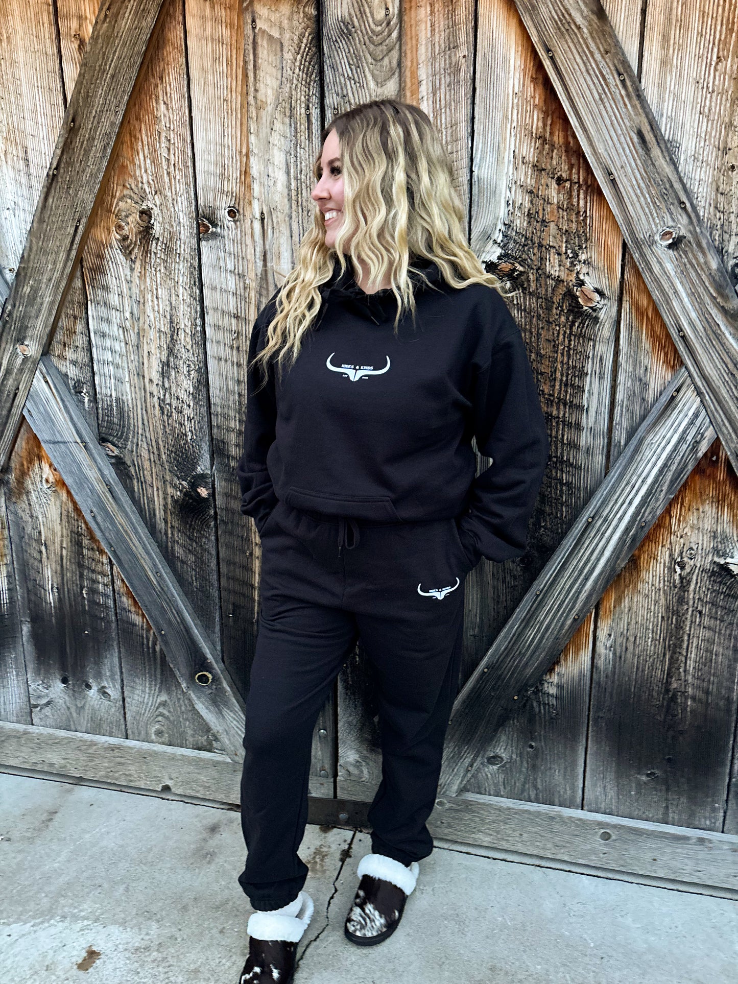 Front view of the Original Logo Matching Set in black with the HK longhorn logo on the hoodie and joggers.