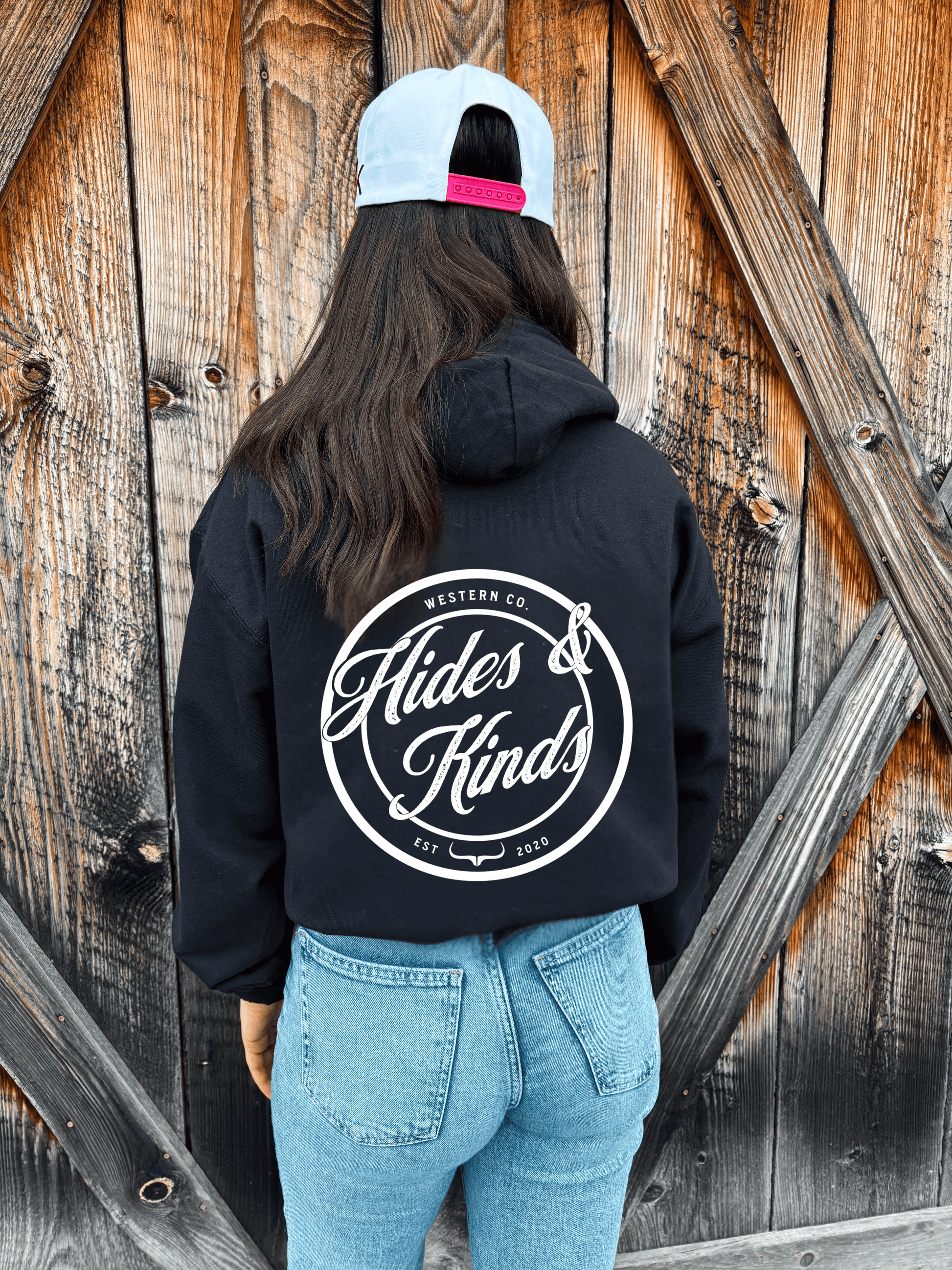 Back view of the Signature Western Hoodie in black featuring the large HK Western script graphic.