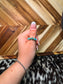 Western turquoise and sterling silver ring styled on hand
