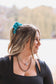 Teal cactus scrunchie styled in blonde hair – country chic look