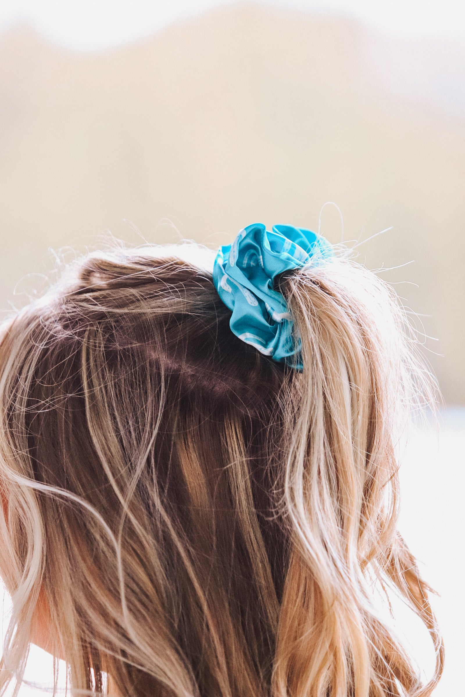 Close up of teal cactus scrunchie – western scrunchie hair tie