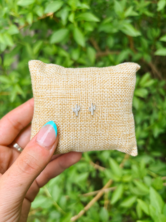 Tiny cactus studs in sterling silver – minimalist desert-inspired earrings.