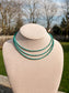 Full view of Turquoise Sierra Necklace with three beaded layers on jewelry bust stand.