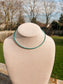 Minimal single strand look of the Turquoise Sierra Necklace on beige jewelry bust.