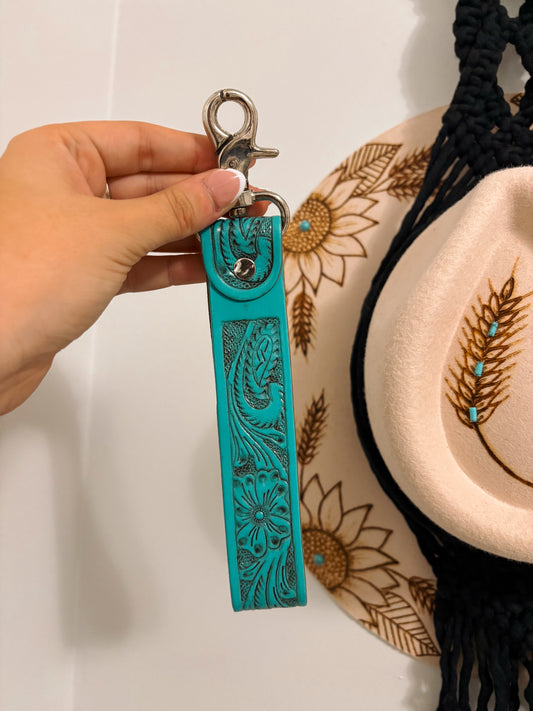 Turquoise Tooled Wristlet with hand-tooled floral leather design and silver clasp – Hides & Kinds
