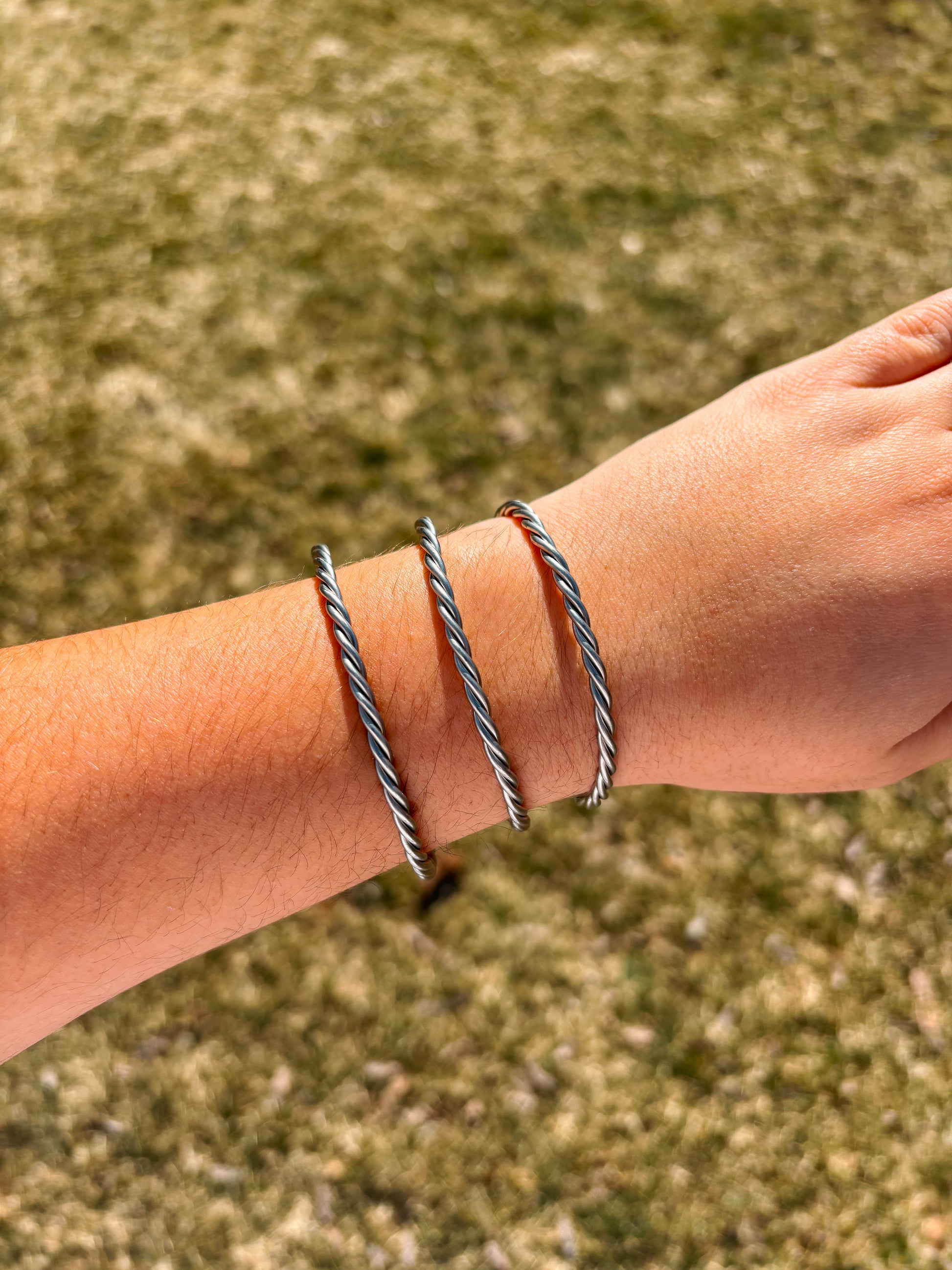 Sterling silver twisted rope cuff bracelet with rustic western design